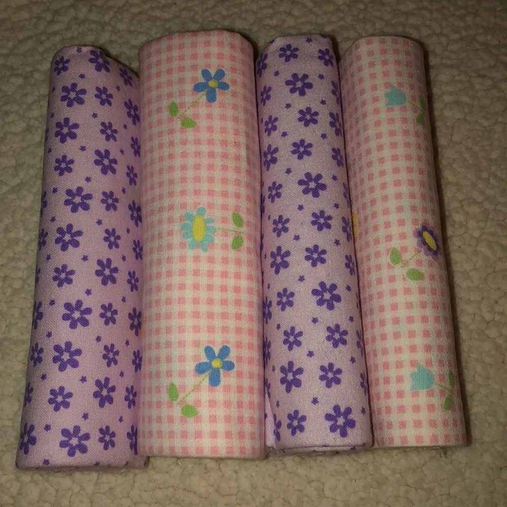 4 pink and purple blankets